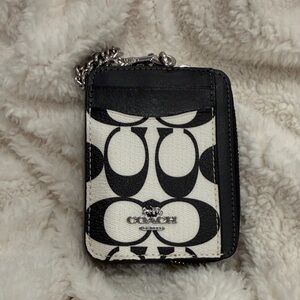 Black and White Coach Wallet with signature C pattern